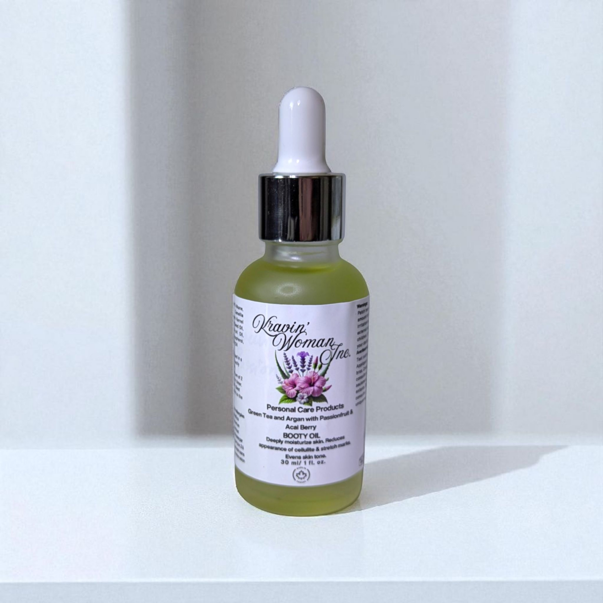 Handmade eco-luxury booty oil by Kravin Woman Inc—passionfruit, green tea, and argan formula for brightening and cellulite care; natural skincare from a female owned brand in Calgary, Alberta.