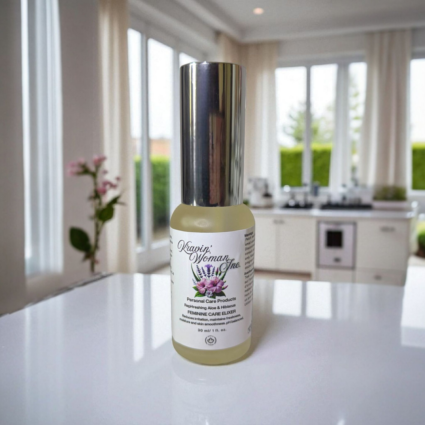 Handcrafted natural yoni elixir from Kravin Woman Inc—aloe, hibiscus, apple cider vinegar, and honey in elegant frosted packaging; luxury Black woman–owned brand based in Calgary, Alberta, Canada.