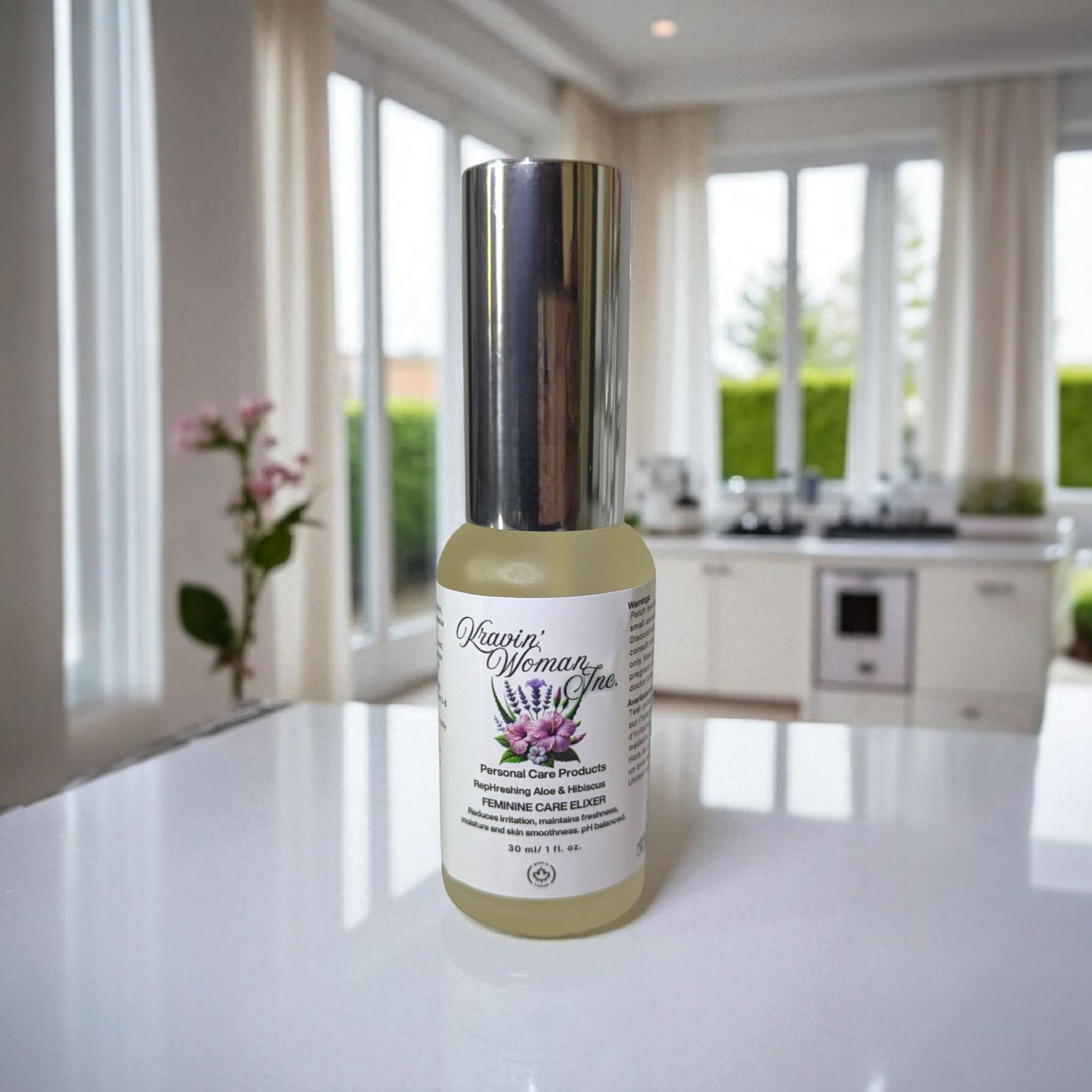 Handcrafted natural yoni elixir from Kravin Woman Inc—aloe, hibiscus, apple cider vinegar, and honey in elegant frosted packaging; luxury Black woman–owned brand based in Calgary, Alberta, Canada.