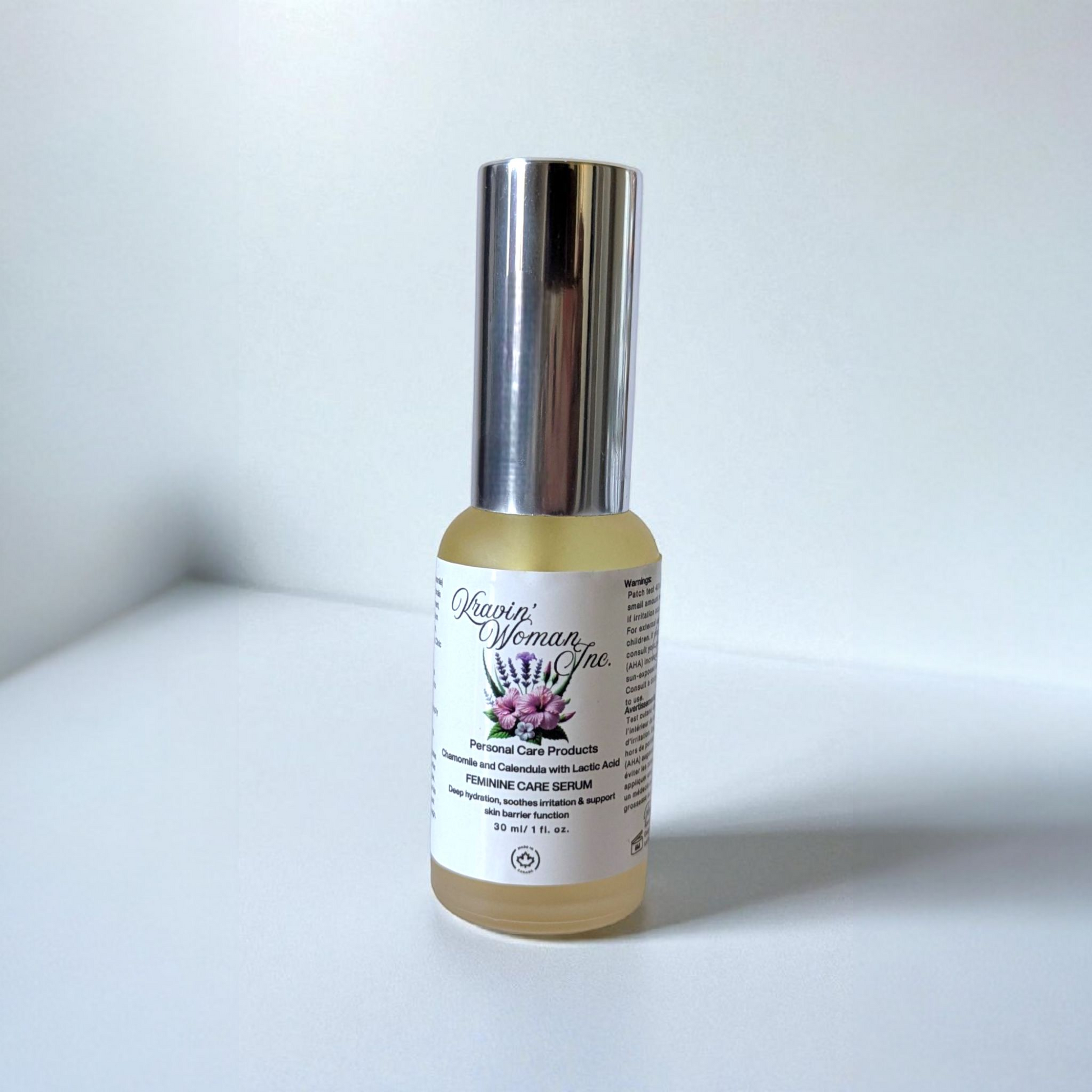 Kravin Woman Inc feminine care elixir in a luxury frosted bottle—natural chamomile, aloe, and hibiscus yoni formula; handmade by a woman-owned brand in Calgary, Alberta, Canada