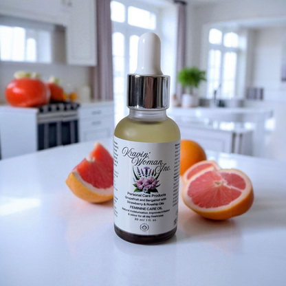 Elegant frosted glass bottle of Kravin Woman Inc yoni hygiene oil—grapefruit, bergamot, and rosehip infused; natural, luxury, eco-friendly skincare handcrafted in Calgary.